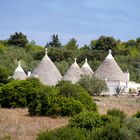 Trulli in der Landschaft nahe Cisternino