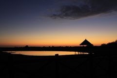 Tsavo east NP Sonnenuntergang am Wasserloch