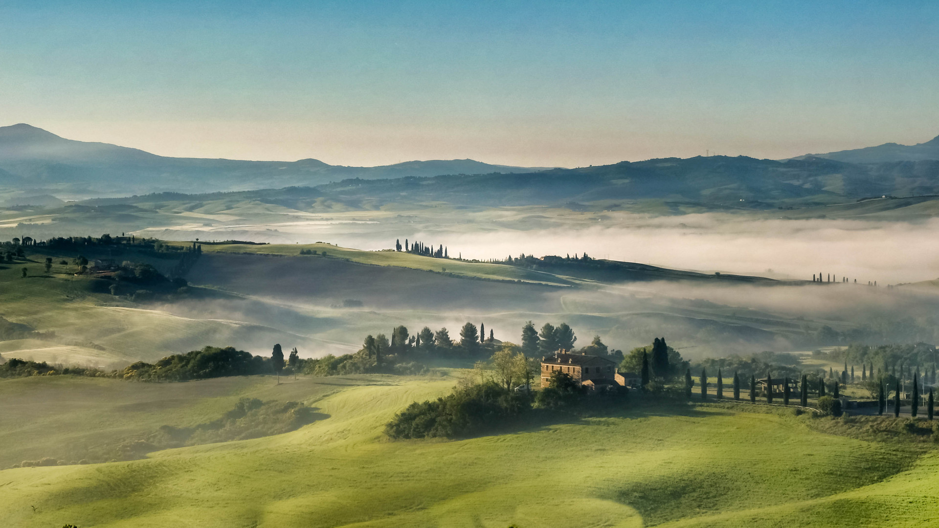 Tuscany in morning fog