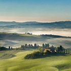 Tuscany in morning fog