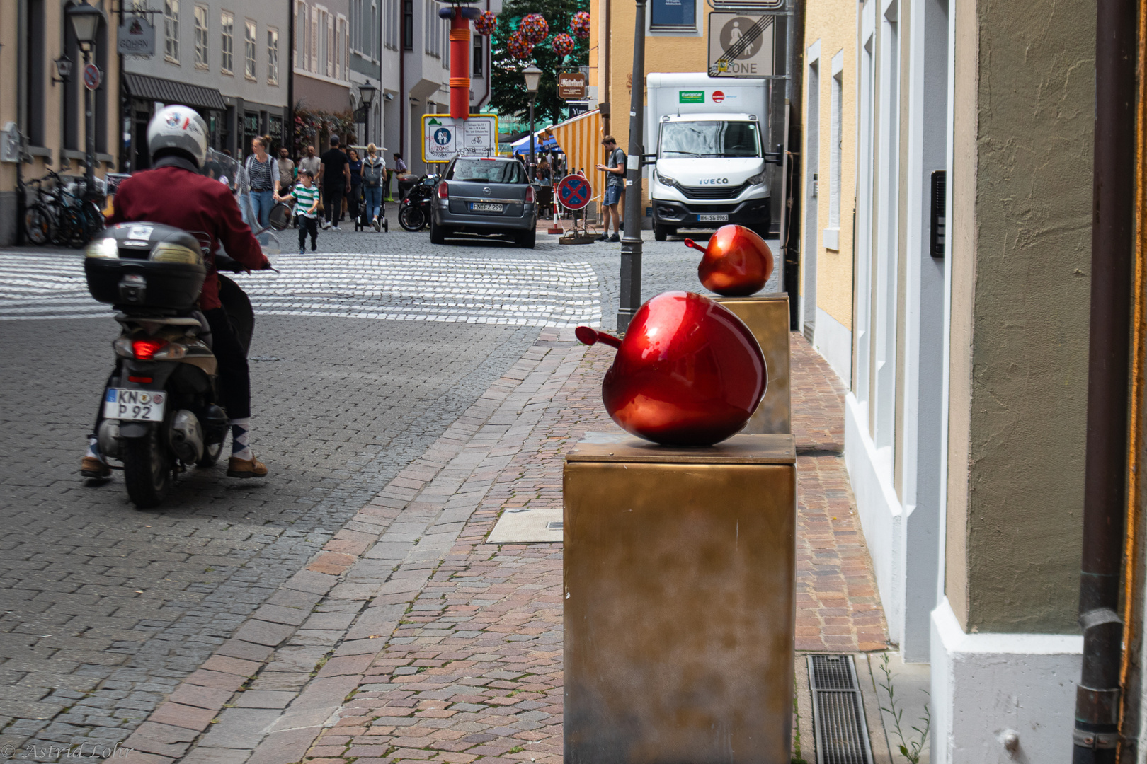 two apples and a motorbike