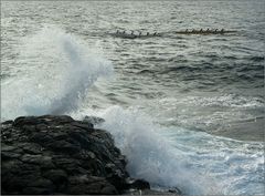 two boats and a wave