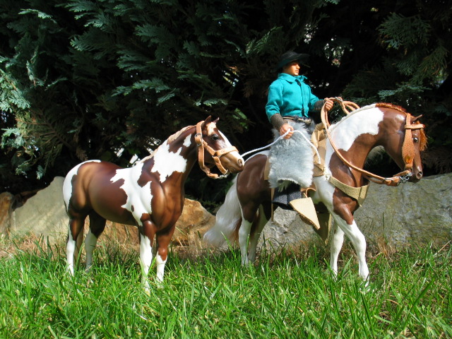 Two Breyer Horses& Cowboy