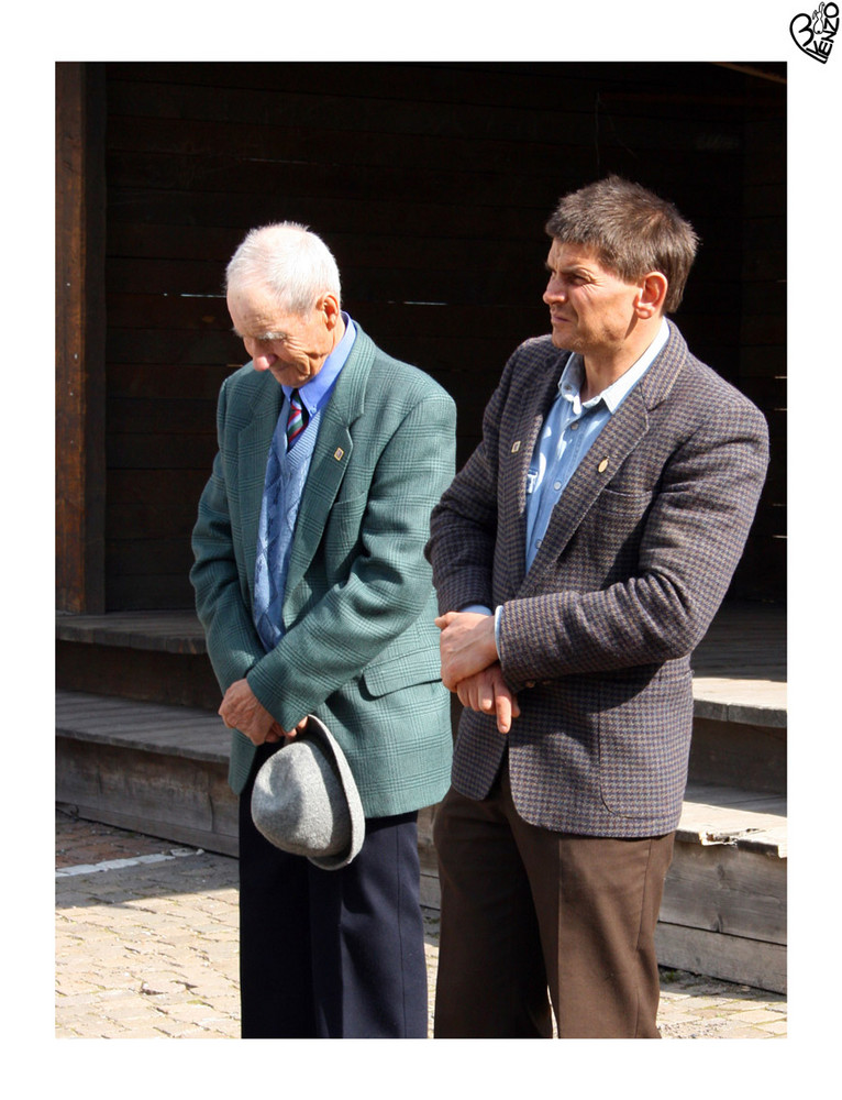 two brothers in front of the church