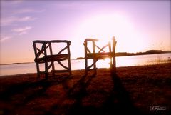 two chairs in the sunset