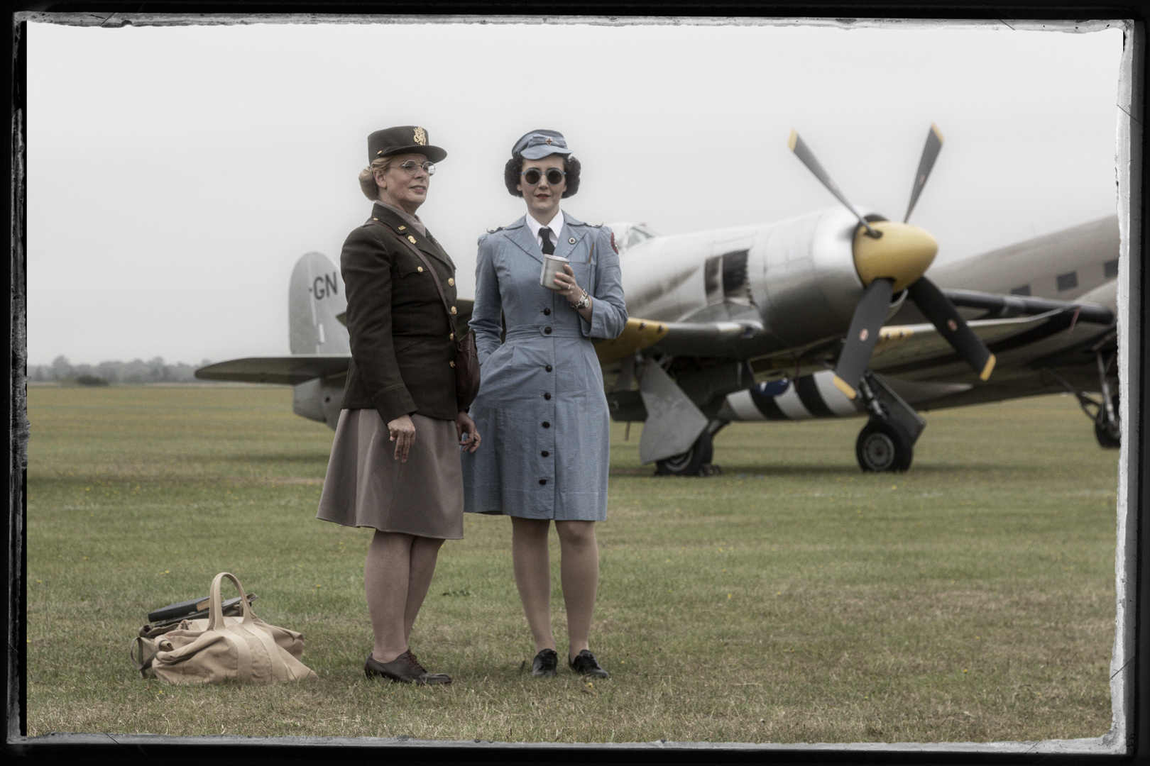 Two Girls in front of an Aircraft 