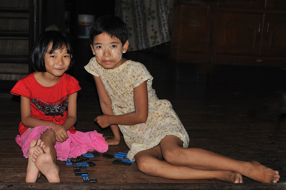 Two girls playing Domino