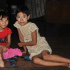 Two girls playing Domino