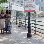 Two ladies walking along the river