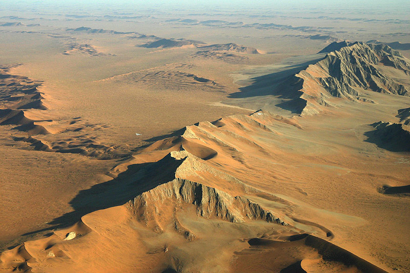 Two little white planes over the Namib Desert