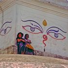 Two lovely girls climb the stupa