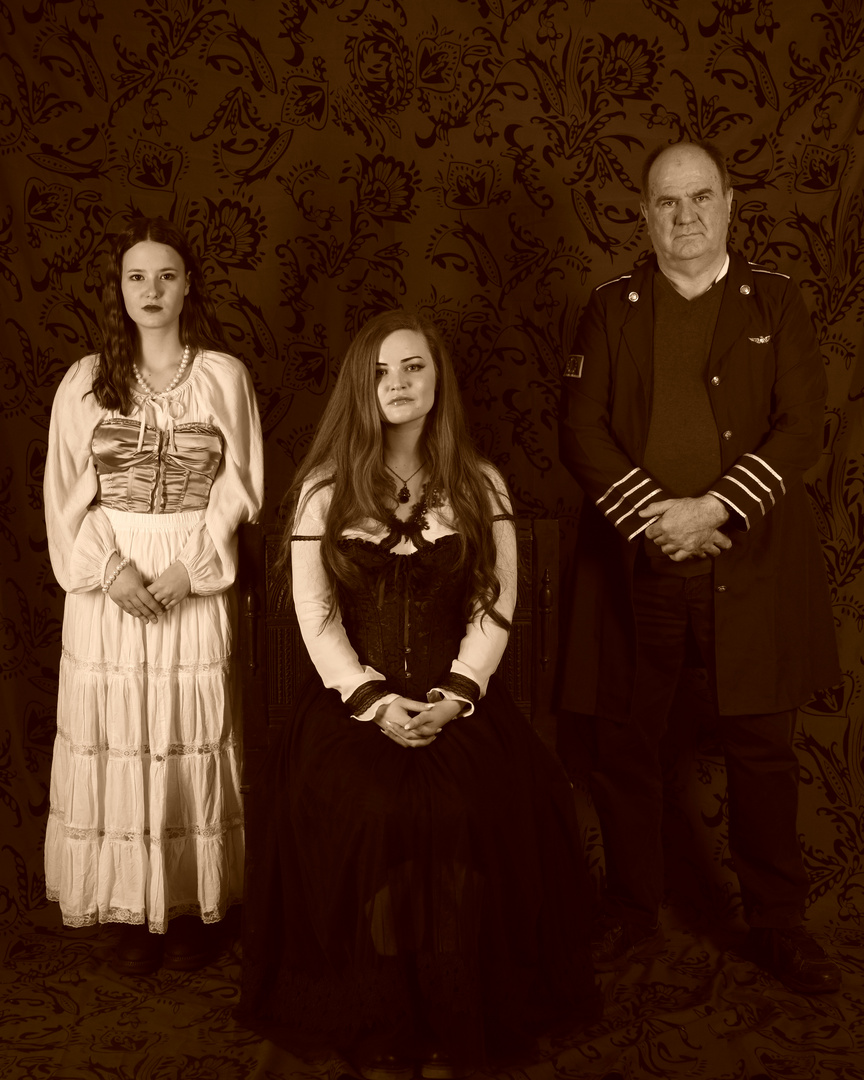 Two models and the photographer in Victorian mode