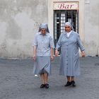 two nuns walk out the bar, and ...