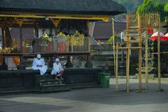 Two pemangku priest in Pura Batu Madeg