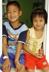 Two Young Isan Kids, Noi & Tarwon, Waiting for Their Parents.