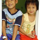 Two Young Isan Kids, Noi & Tarwon, Waiting for Their Parents.