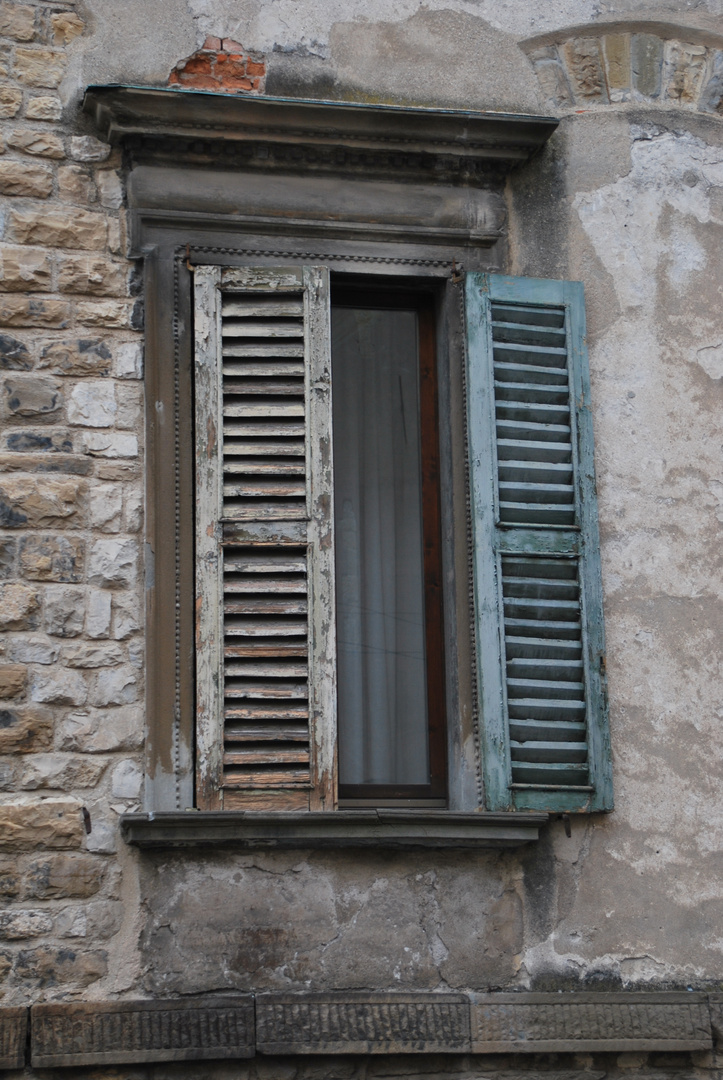 typical old window shutter in Bergamo (Italy)