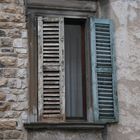 typical old window shutter in Bergamo (Italy)