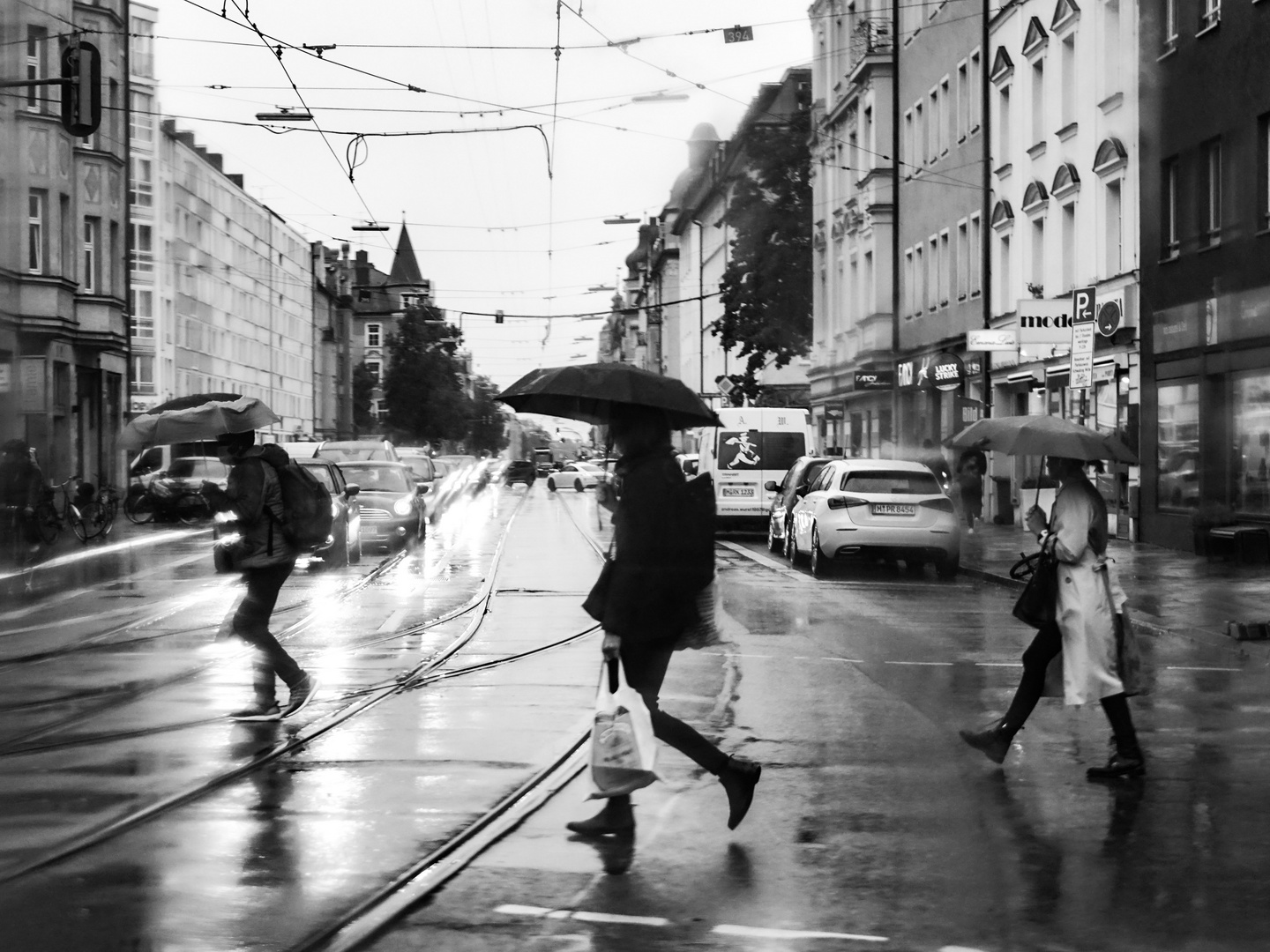 Umbrellas crossing