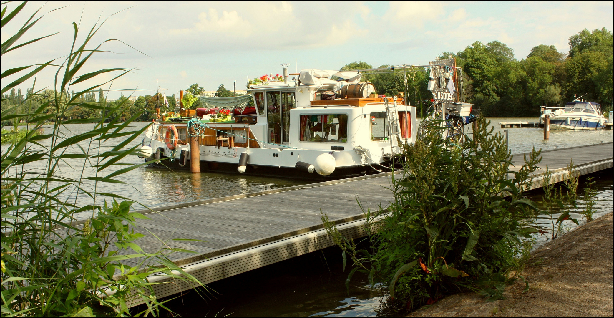 Un bateau familial en bord de Moselle