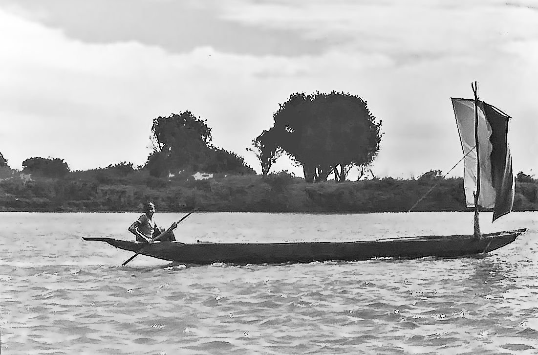 Un fleuve, une pirogue, une voile, un homme