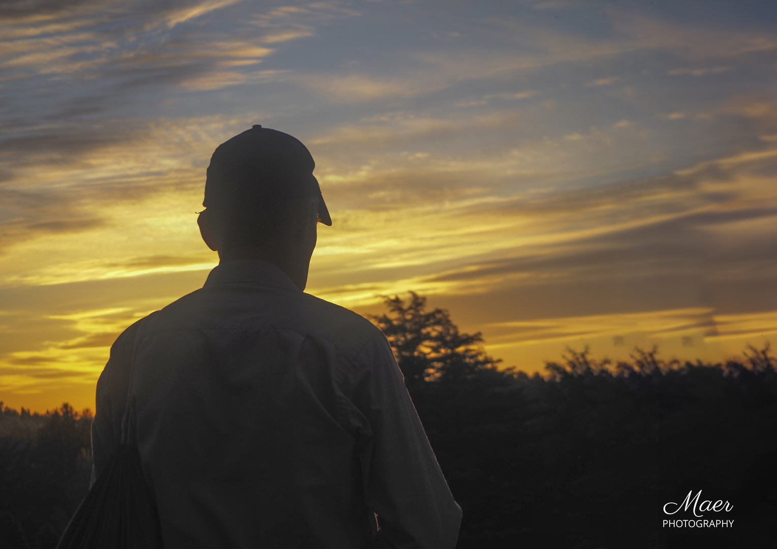 Un fotógrafo enamorado de la puesta de sol.