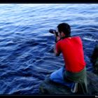 Un fotografo tra le onde