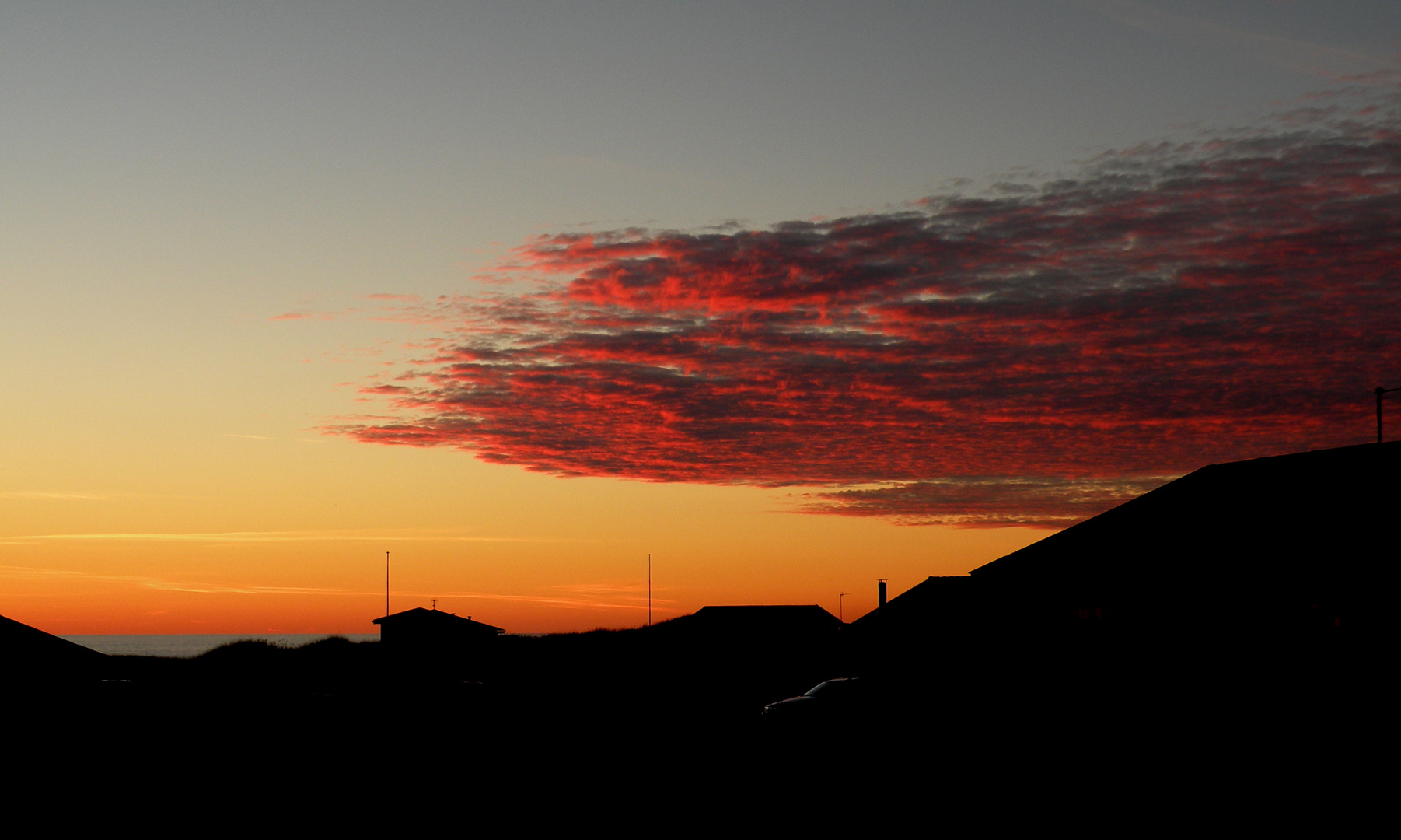 Und noch ein Sonnenuntergang in Lønstrup , diesmal mit Wolke.