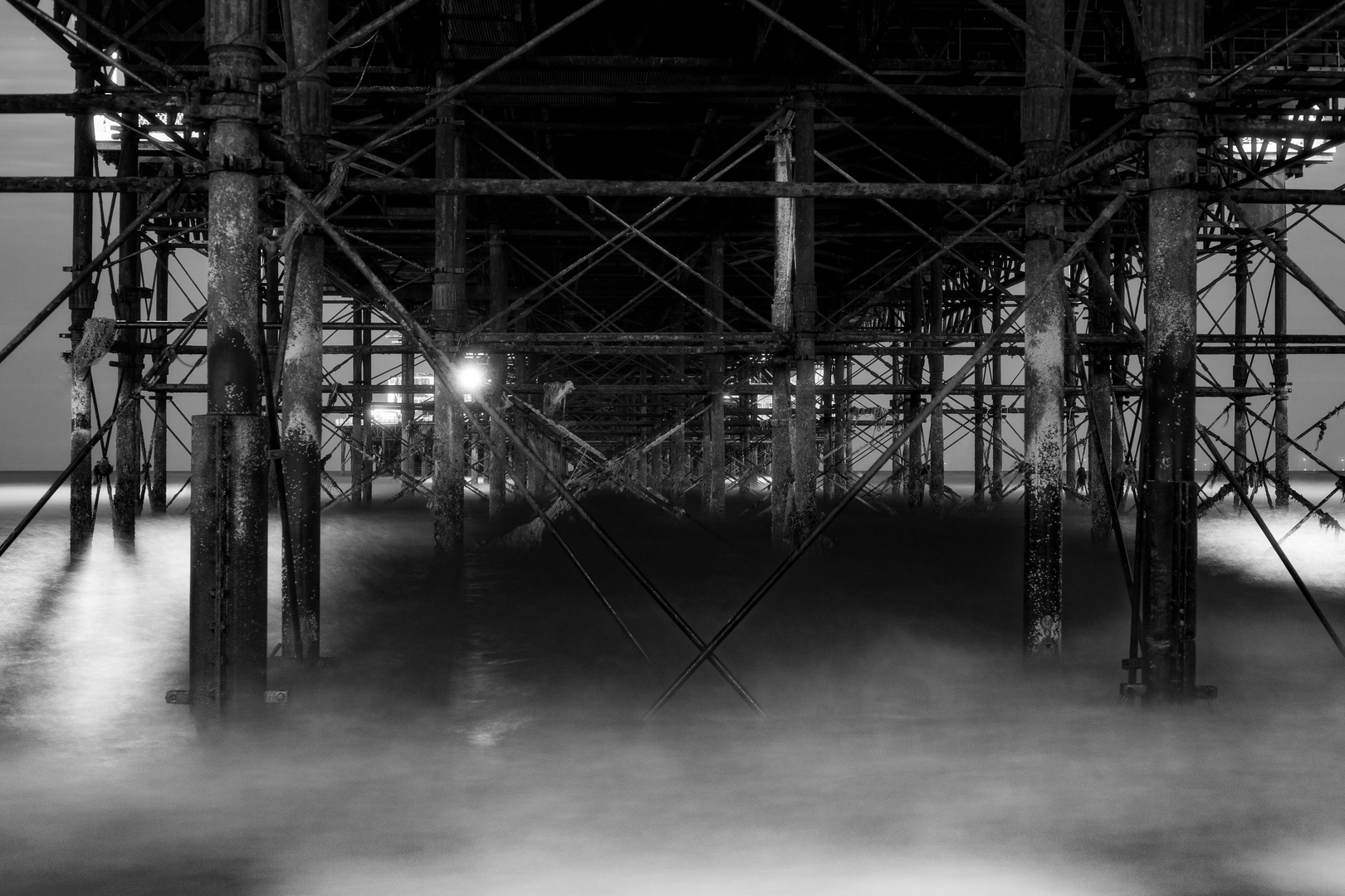 Under the Brighton Pier by night