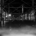 Under the Brighton Pier by night