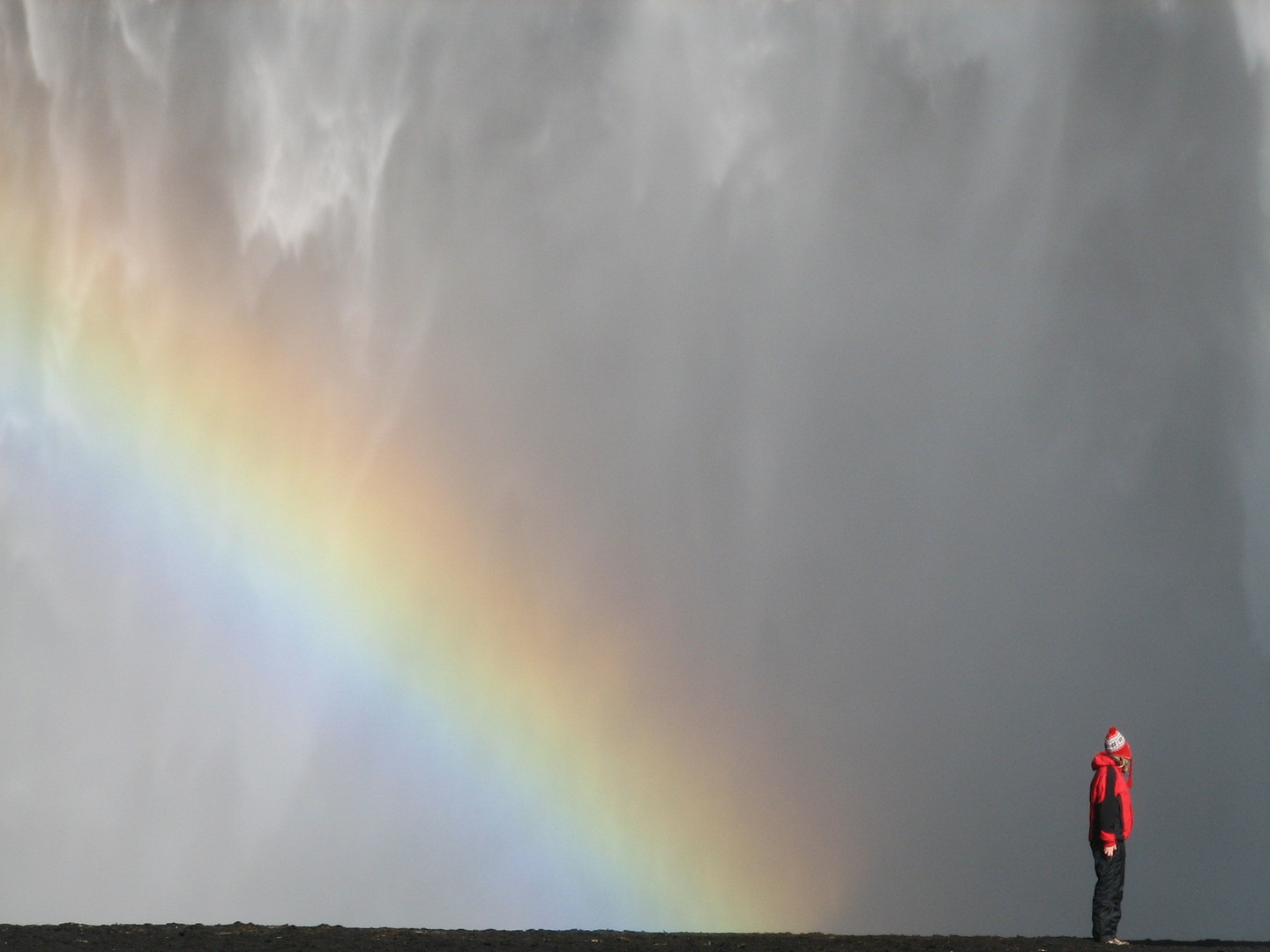 under the waterfall