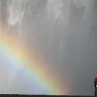 under the waterfall