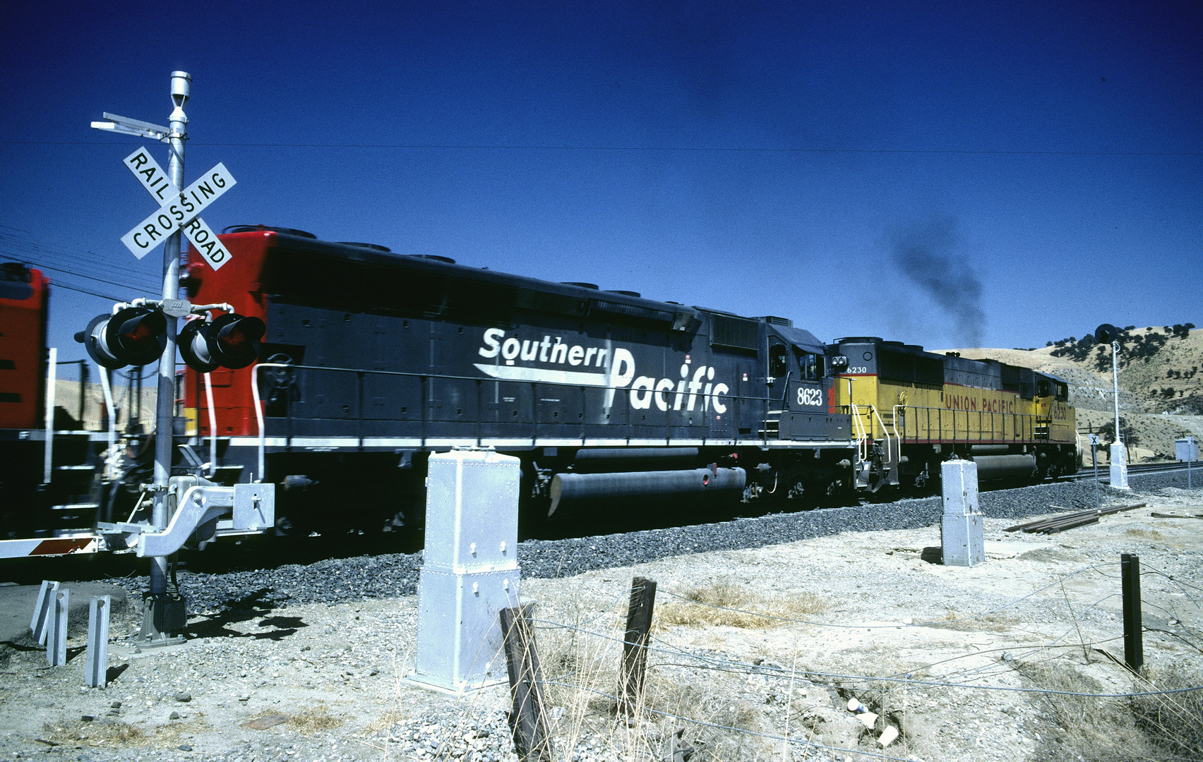 Union Pacific SD60M UP#6230, Southern Pacific EMD SD40M-2 SP#8623 passes Caliente,CA