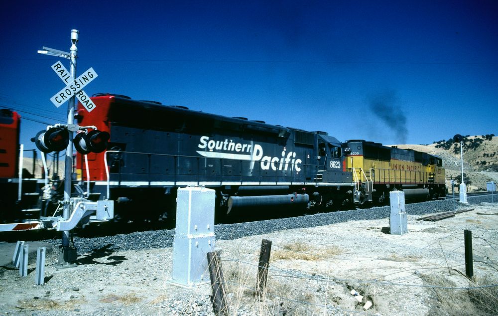 Union Pacific SD60M UP#6230, Southern Pacific EMD SD40M-2 SP#8623 passes Caliente,CA