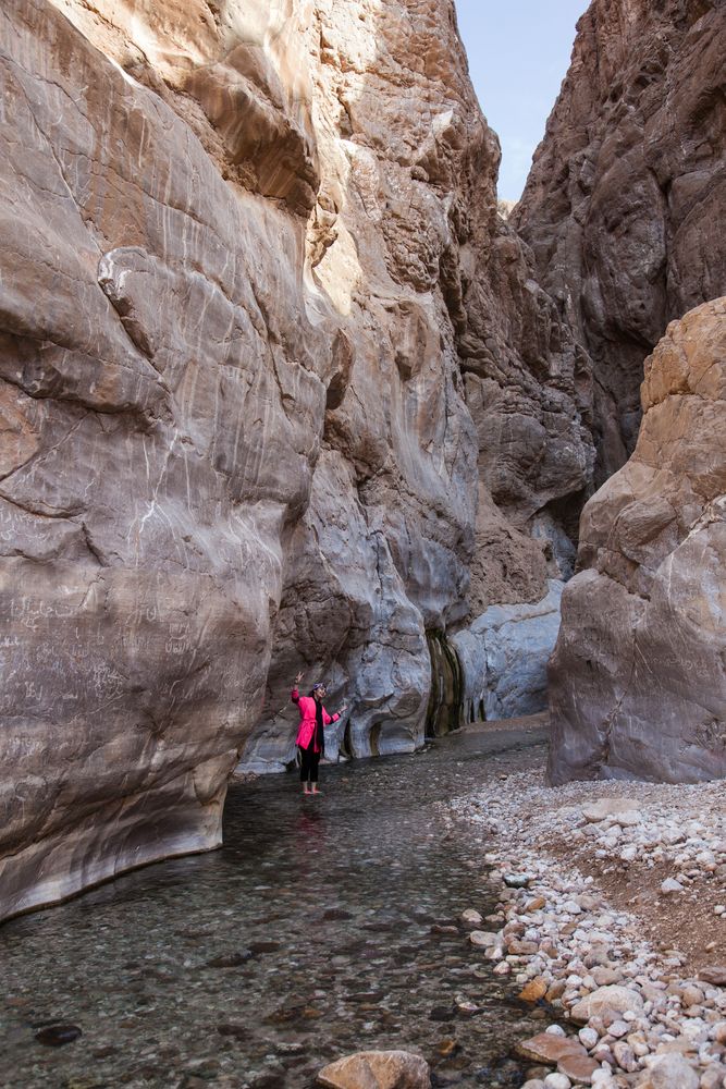 Unkown woman and canyon Iran