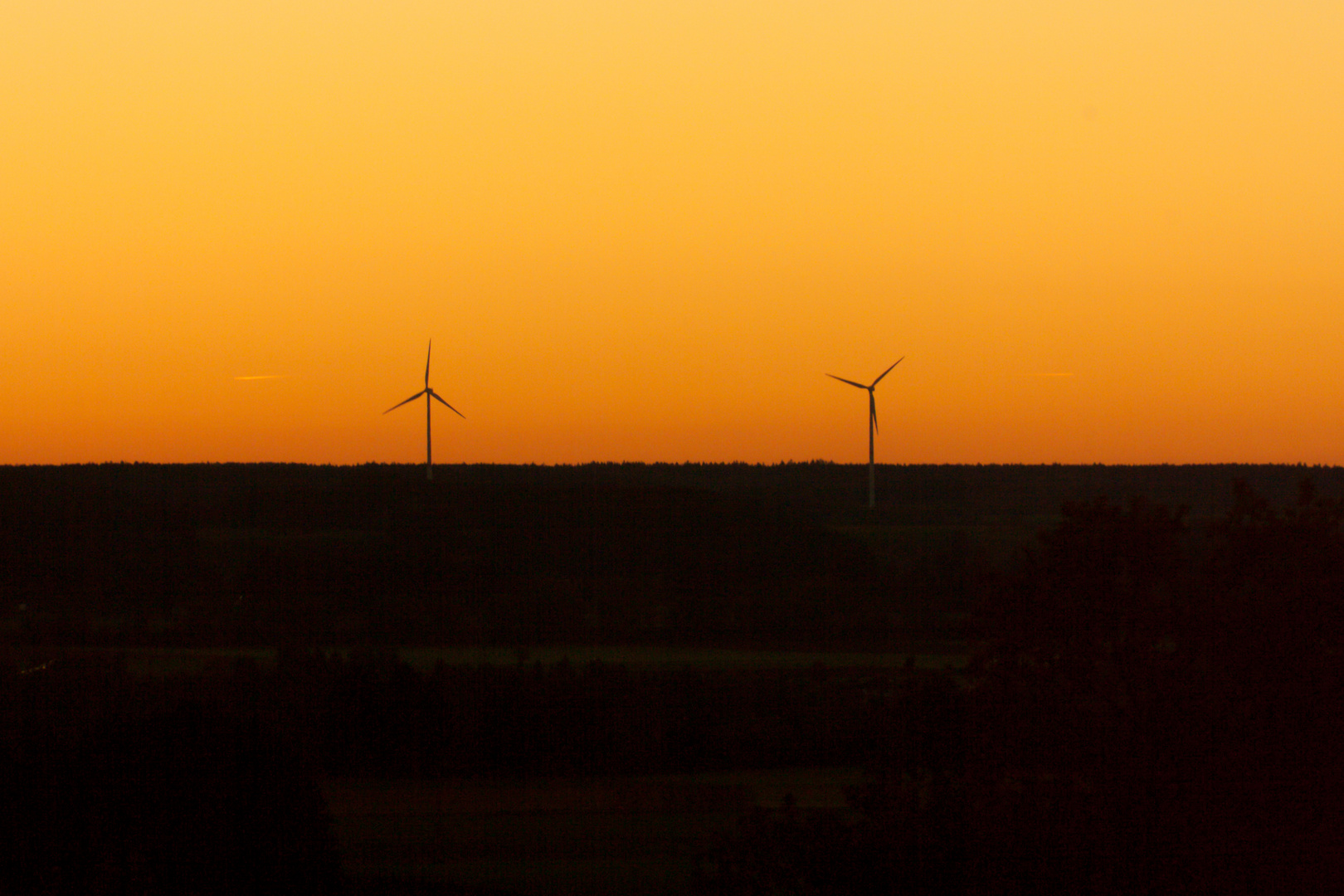 Unsere Energiewende bei Sonnenuntergang