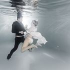Unterwasser Paarshooting während der Schwangerschaft