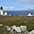 Unterwegs in Schottland - Leuchtturm bei John o´Groats, im Hintergrund die Orkney Inseln