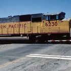 UP#6230, SP#8623 on their way to Tehapachi Loop, passing road to Caliente,CA