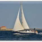 Velero y faro en Formentera (Ibiza)