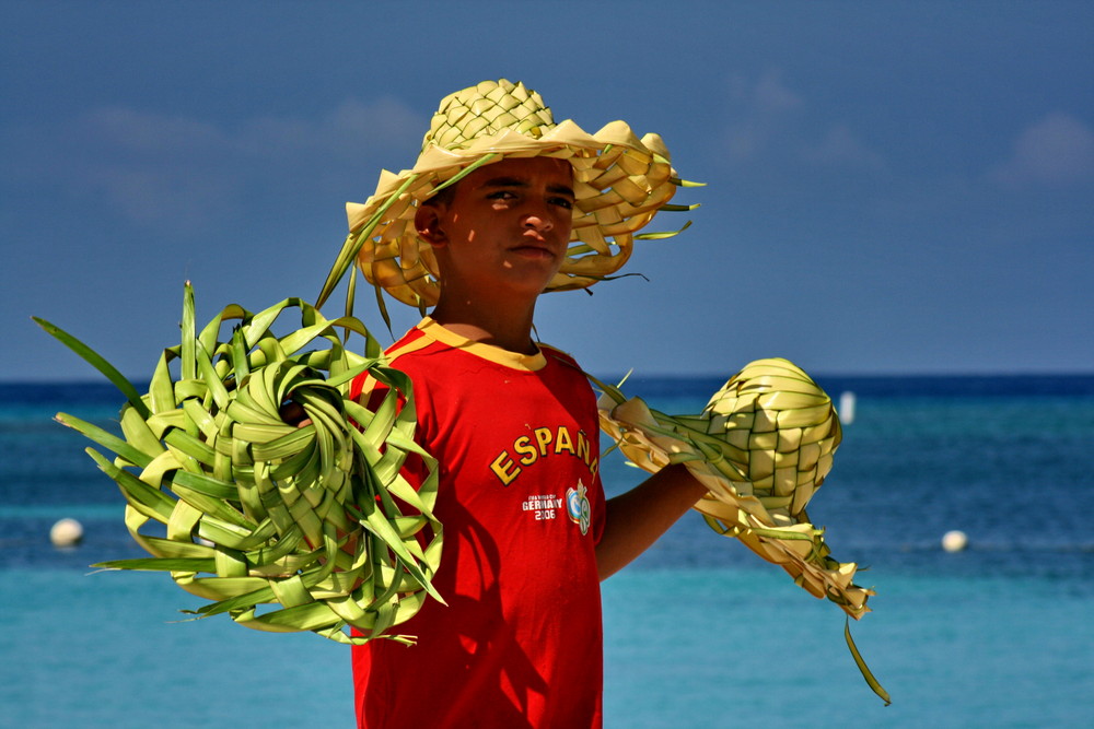 Venditore di cappelli.