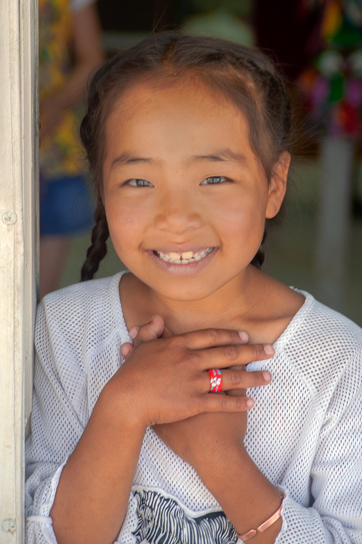 Vendor girl in a tourist shop