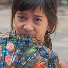 Vendor girl sells fans