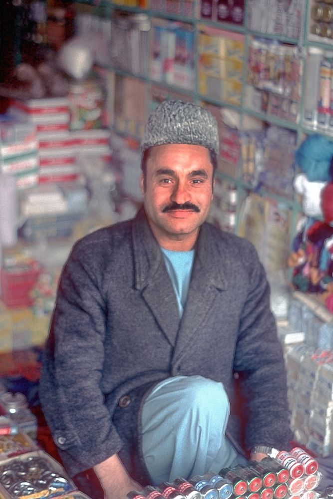 Vendor offers his products in his ordinary shop in Herat