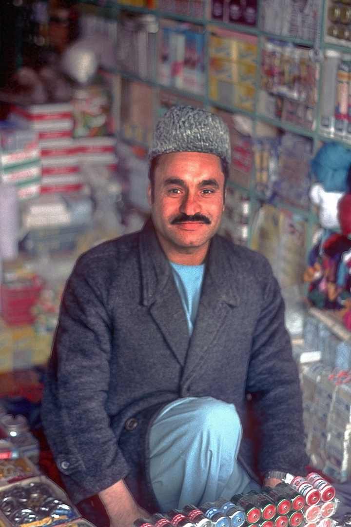 Vendor offers his products in his ordinary shop in Herat