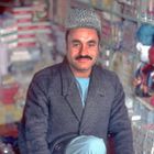 Vendor offers his products in his ordinary shop in Herat