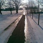 Vereister Weg am Hohen Peißenberg/Oberbayern im Winter