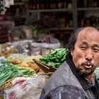 Verkäufer auf dem Markt in Kunming