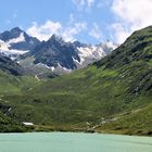 Vermunt-Stausee auf der Bieler Höhe 2023 m, im Hintergrund die Silvrettagruppe