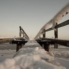 verschneite Seebrücke